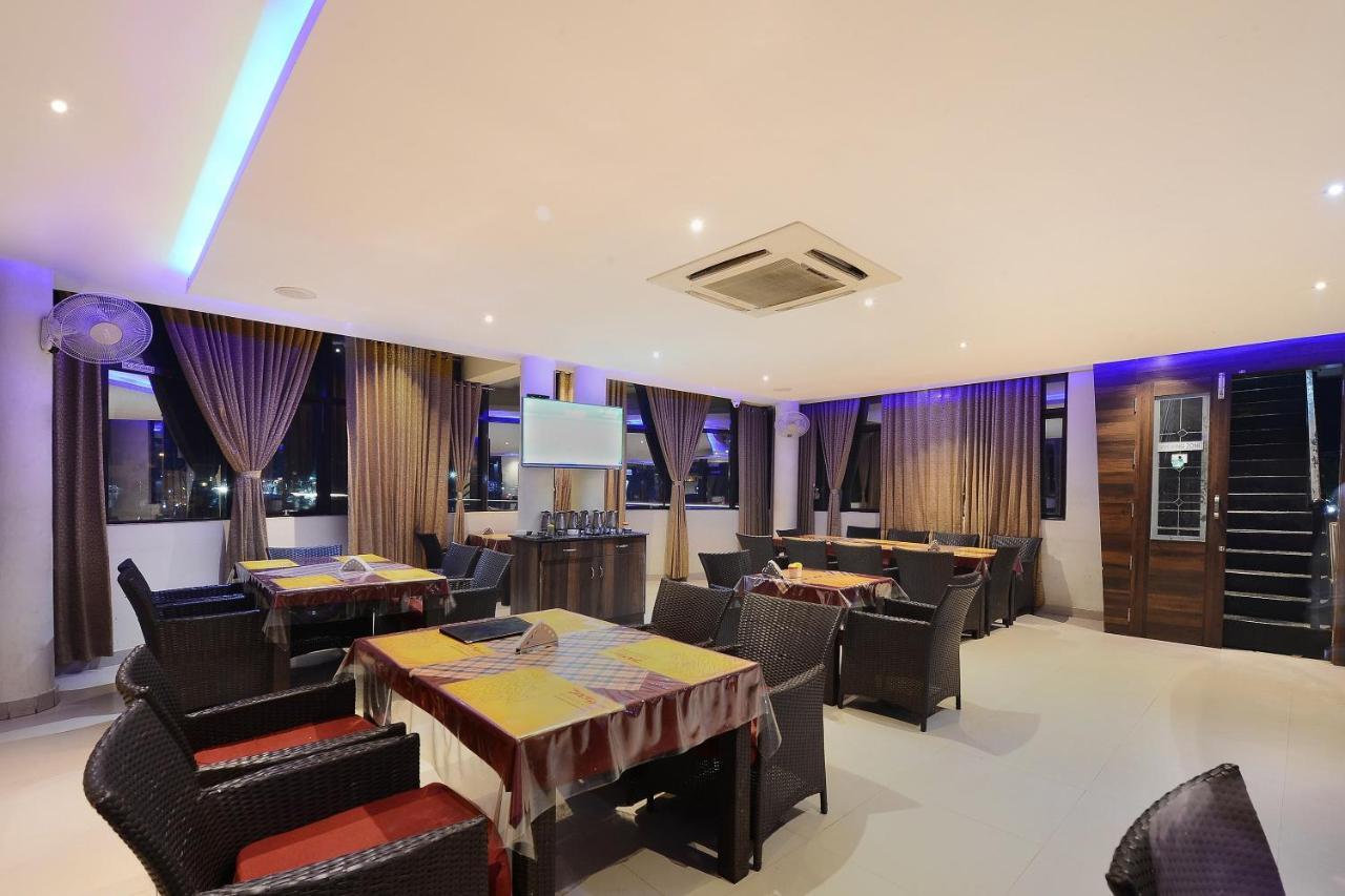 Capital O Hotel Samanvi International Belur  Eksteriør billede
